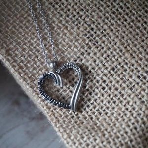 Black and white diamond heart pendant